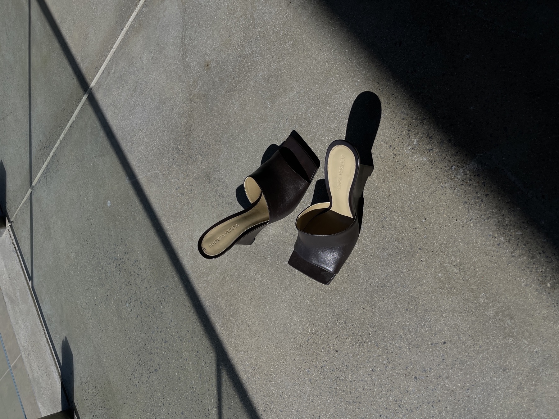 Sculptural shoe detail in directional light