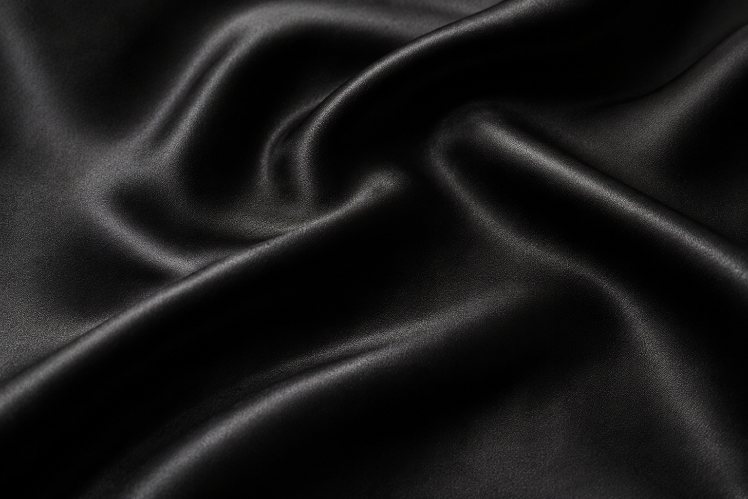 Black satin fabric folds